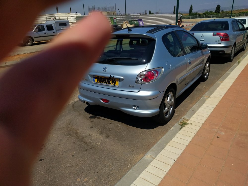 הרכב בחניה לפני &#.jpg