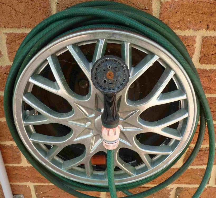 A hub cap on my hose reel.jpg