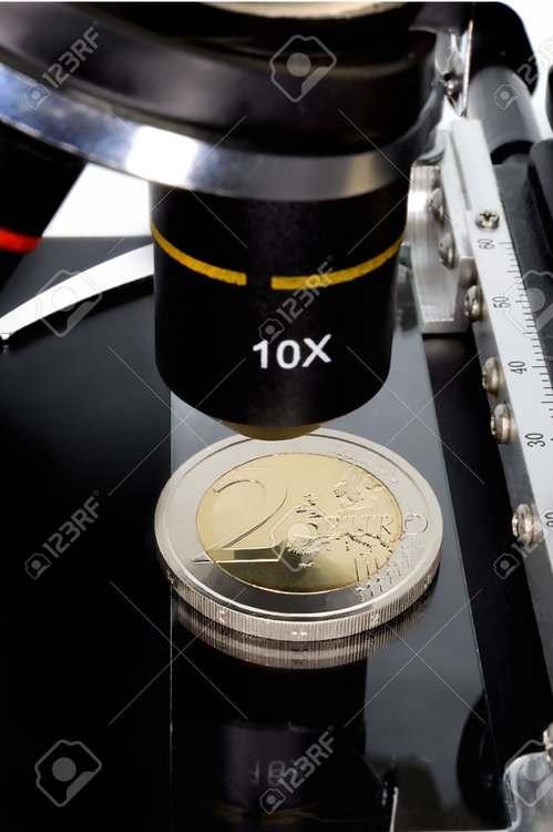 38075576-Euro-currency-in-check-under-the-microscope--Stock-Photo.jpg