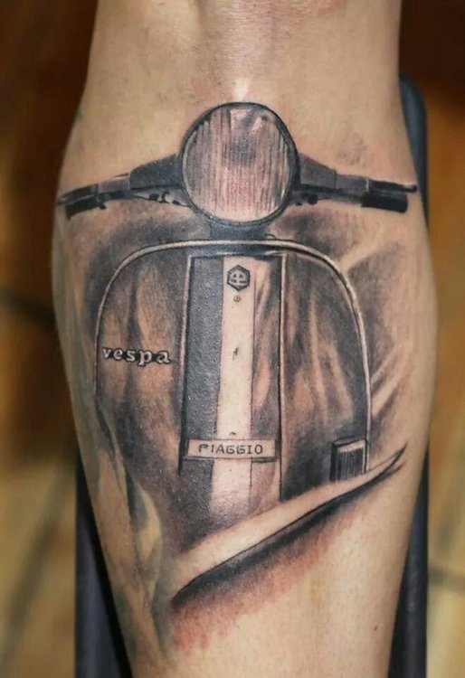 Grey-Ink-Vespa-Scooter-Tattoo-On-Left-Forearm.jpg